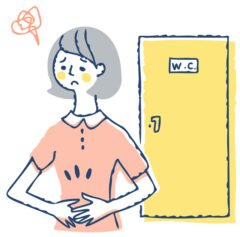 腸の不調を訴える女性